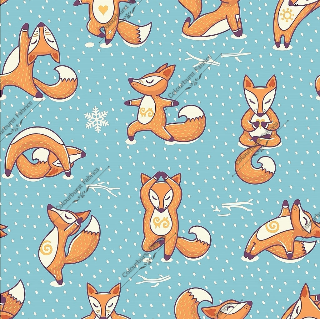 Winter yoga foxes on a light blue background with falling snow and snowfakes. Seamless design for custom fabric printing onto our 22 bases